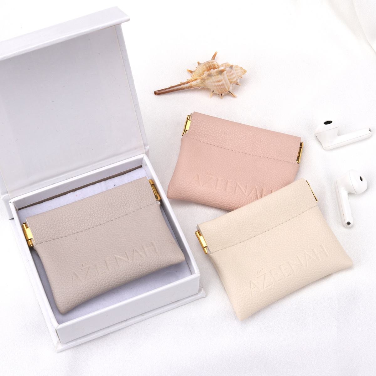 faux leather pouches embossed logo
